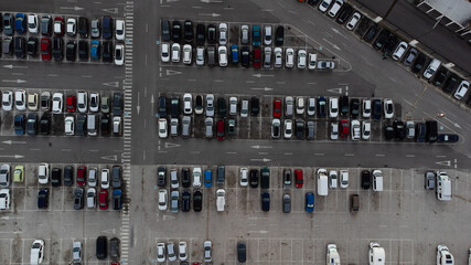 Parking. Aerial view of cars parked in line in a parking lot. Colored cars. drone view