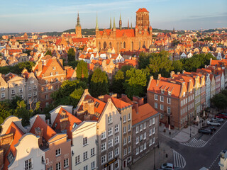 Obraz premium A warm summer day above the Old Town in Gdańsk. Aerial photo of the monuments of this old town.