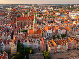 A warm summer day above the Old Town in Gdańsk. Aerial photo of the monuments of this old town. - obrazy, fototapety, plakaty