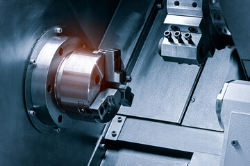 Manufacturing CNC professional lathe machine, Industrial concept.