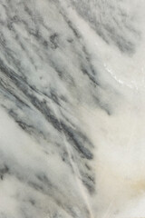 Drawing on the surface of a gray marble slab. Background. Space for text. Vertical.