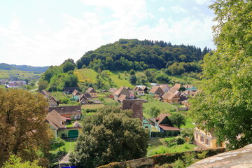 Obraz premium The village of Biertan, (Birthälm) and surrounding landscape, Sibiu County, Romania. Seen from the fortified church of Biertan, which is a UNESCO World Heritage Site.