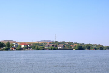 Fototapeta na wymiar Mahmudia in Danube Delta view from the river during a sunny day