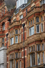 Fototapeta na wymiar Perspective of old apartment buildings in London