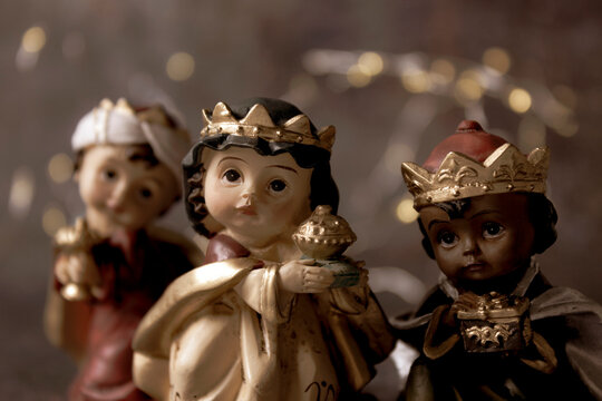 The Three Kings carrying their gifts adoring the Child Jesus. Close up. Epiphany day concept.