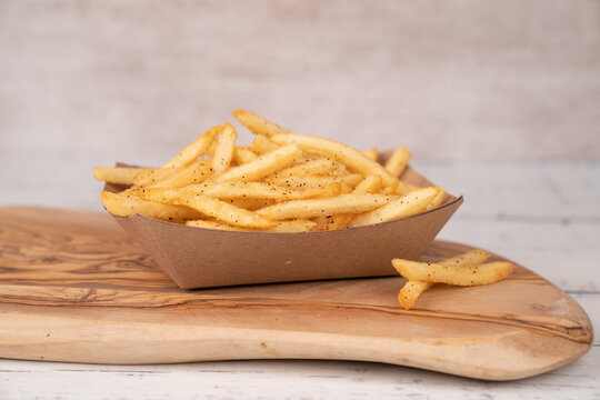 French fries in cardboard container 