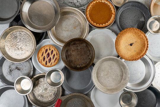 Assortment of vintage pie plates and pies
