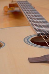 Obraz premium a new acoustic guitar close up 