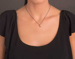Jewelry. Gold chain necklace on woman