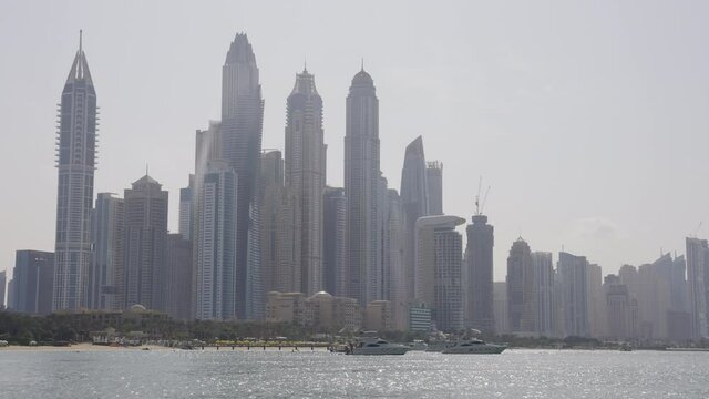 Dubai Marina Skyline from the Sea with Boats in the Foreground