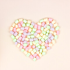 Heart Marshmallows Background. Top view, sweets and candy concept. Pastel color dessert for background or wallpaper decor.