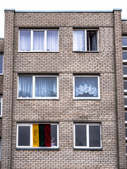 Building and Lithuanian flag on the window