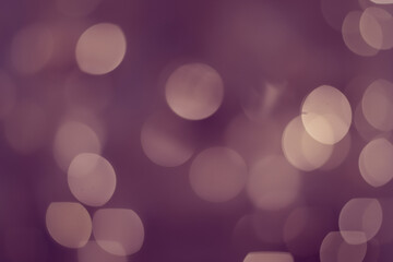 Christmas bokeh lights in a circle very peri