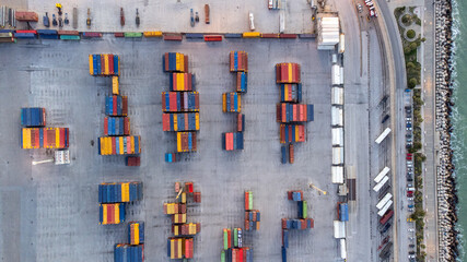 Containers grouped for loading onto ships. Aerial view of the logistics field