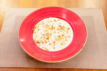 The gnocchi are made with potato, flour and ricotta cheese. A well-known variety in the Friuli-Venezia Giulia and Trentino-Alto Adige regions and called gnocchi di pane is made with breadcrumbs.