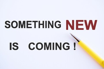 Handwriting text Something new is coming. Concept meaning something is going to happen in really short time of period, business concept, Top view.
