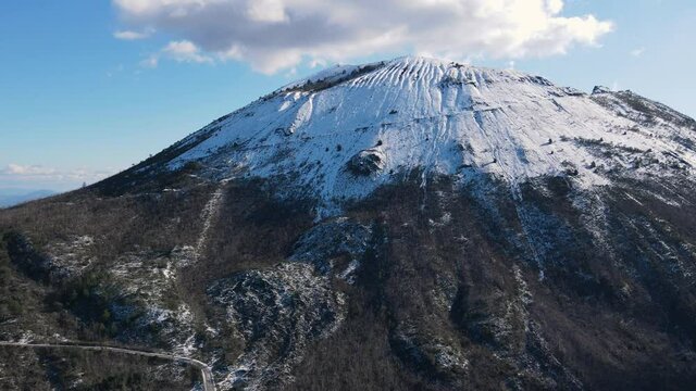 Vesuvius volcano crater next to Naples. Campania region, Italy. Shooting a quadcopter, shooting from the air. Aerial view of Vesuvius volcano in winter.