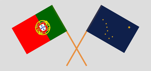 Crossed flags of Portugal and the State of Alaska. Official colors. Correct proportion