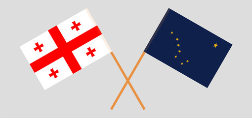 Crossed flags of Georgia and the State of Alaska. Official colors. Correct proportion