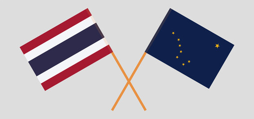 Crossed flags of Thailand and the State of Alaska. Official colors. Correct proportion