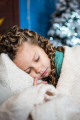 cute girl sleeping. adorable baby closed her eyes. do-it-yourself blanket. white, European baby