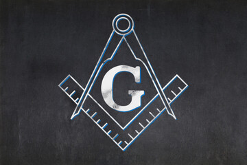 Masonic Square and Compasses drawn on a blackboard