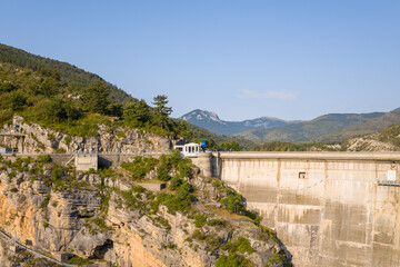 Fototapeta na wymiar The Barrage de Castillon installed on steep rocks in Europe, France, Provence Alpes Cote dAzur, Var, in summer, on a sunny day.