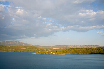 The Lake of Sainte-Croix under the clouds in Europe, in France, Provence Alpes Cote dAzur, in the Var, in summer, on a sunny day.