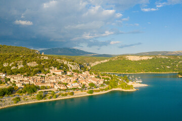 The town of Bauduen on its green mountain in Europe, France, Provence Alpes Cote dAzur, Var in the summer on a sunny day.