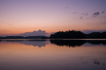 Fototapeta na wymiar The Lac des Settons at sunset in Europe, France, Burgundy, Nievre, Morvan, in summer.