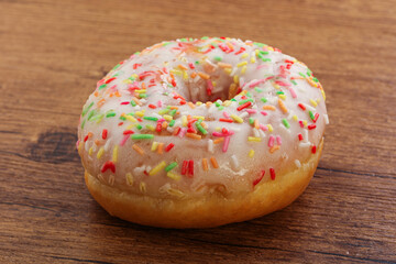 Sweet glazed vanilla donut with icing