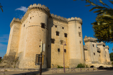 Old stone Castle of Tarascon on blue sky background, France