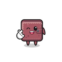 leather wallet character doing Korean finger heart