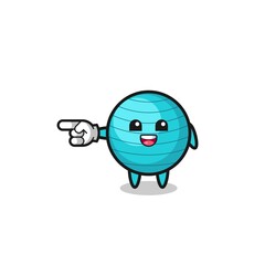 exercise ball cartoon with pointing left gesture