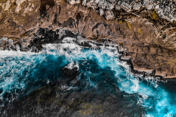 Stylized Long Exposure Drone Shot of Shelly Headland Waves