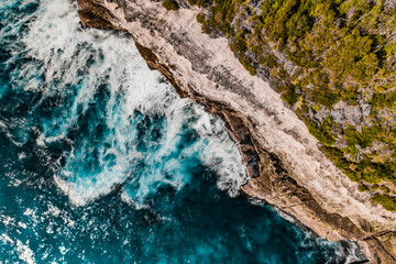 Obraz premium Stylized Long Exposure Drone Shot of Shelly Headland Waves