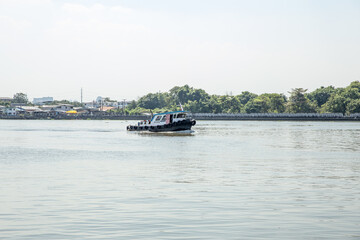 The tugboat is moving in the Chao Phraya river, Thailand