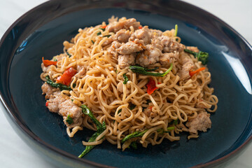 stir-fried instant noodles with basil and minced pork