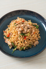 stir-fried instant noodles with basil and minced pork
