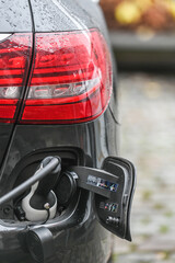 Fototapeta premium auto voiture electrique recharge electricité borne autonomie