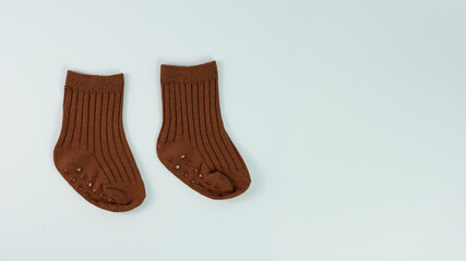 a pair of cute little baby socks isolated on white background
