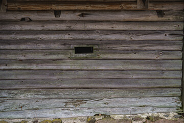 Window in an old wooden house. 