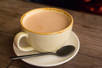 cup of hot coffee on a table