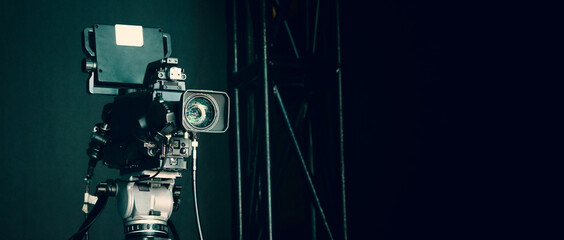 TV Camera broadcast on the crane tripod for shooting or recording and broadcasting content in studio production to on air tv or online internet live show. HD Video recording on crane. Selective focus.
