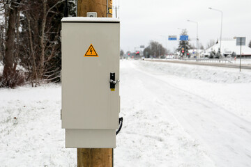 Electricity distribution box at the pole outside on the street