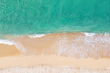 Fototapeta na wymiar A ocean waves and beach aerial view, natural background.