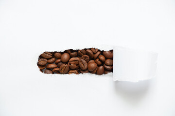 coffee beans on isolated white background, coffee background, torn paper