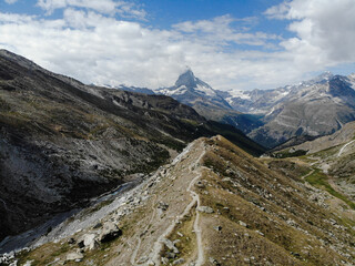 Fototapeta na wymiar A path leads to a view of the Matterhorn. created by dji camera