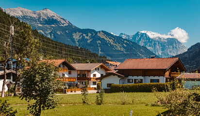 Fototapeta na wymiar Beautiful alpine summer view with the famous Zugspitze summit in the background at Bichlbach, Tyrol, Austria