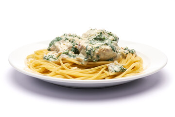 Portion of delicious meatballs with spinach in a creamy sauce and pasta